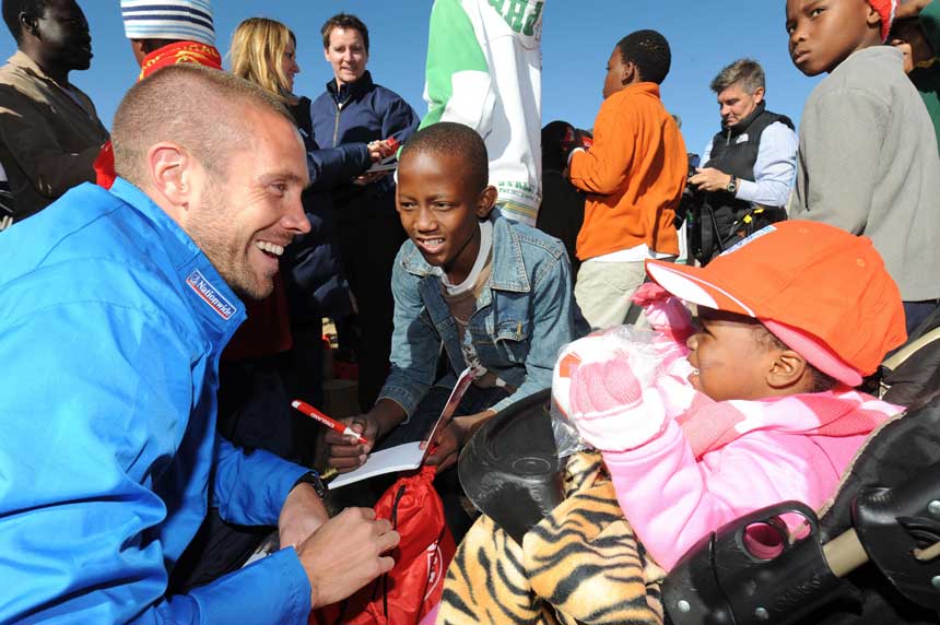 Matthew Upson chats with South African orphans in Rustenburg.